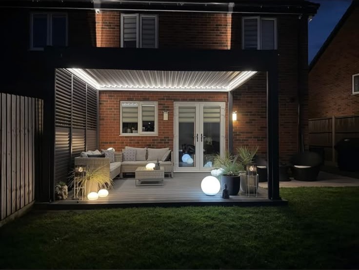 Illuminated modern pergola and deck built by RBL Landscapes