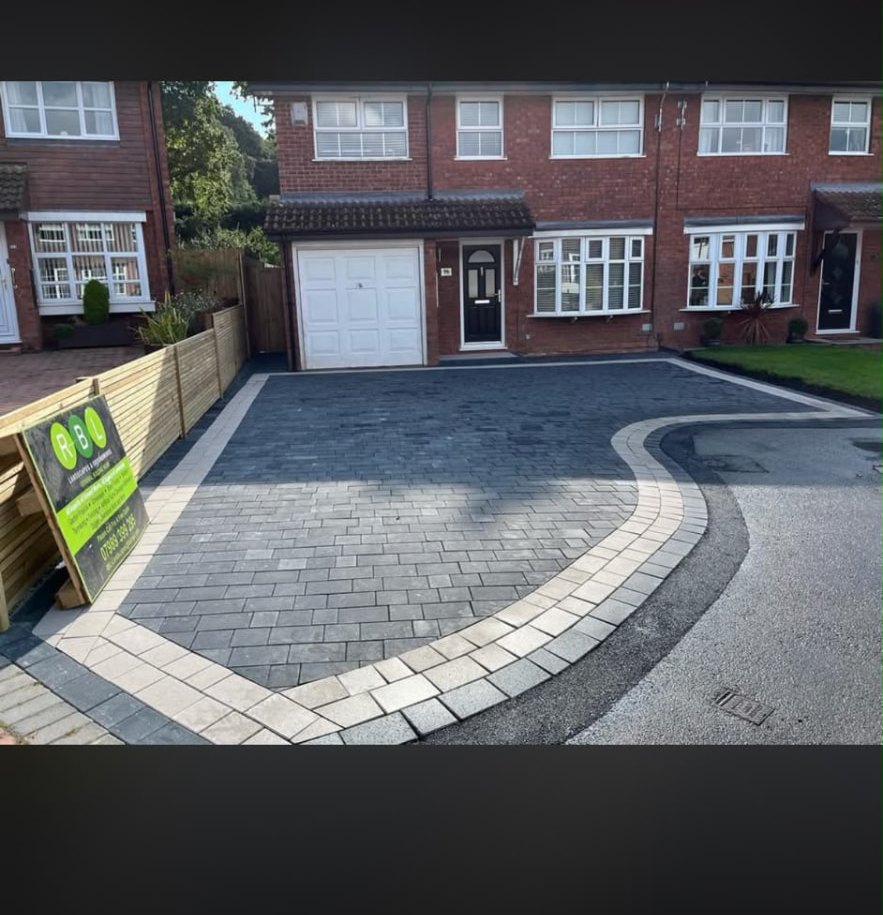 Grey block paved driveway with contrasting border